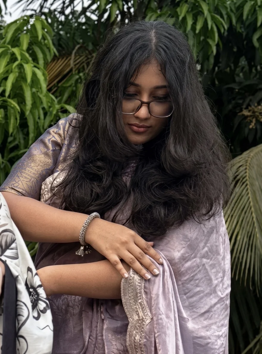 Captain in a lavender outfit outdoors